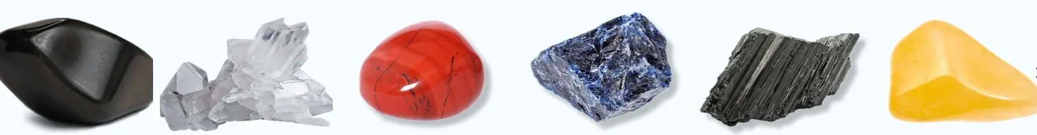 Natural gemstones including obsidian, clear quartz, red jasper, sodalite, black tourmaline, and yellow calcite